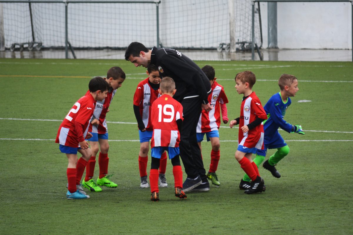 Coach and a children's sports team